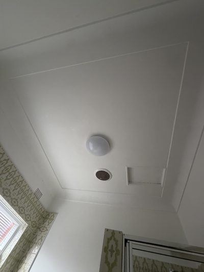 The same ceiling restored to a clean white finish