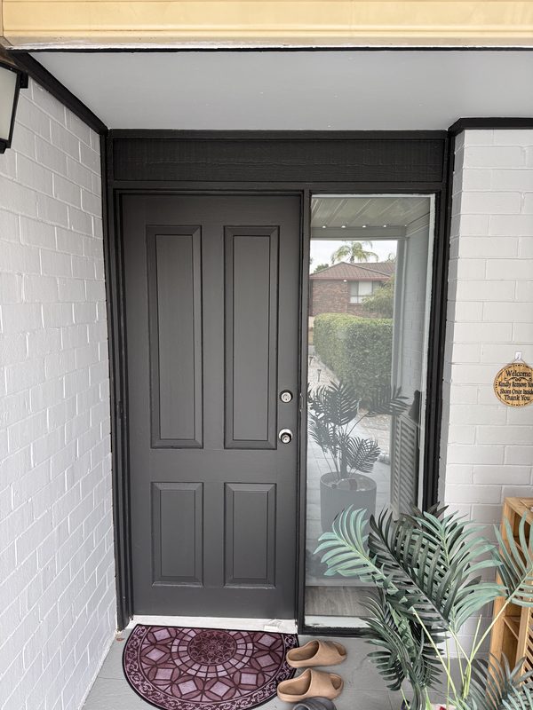 Front entry repaint with masonry in white and a charcoal door
