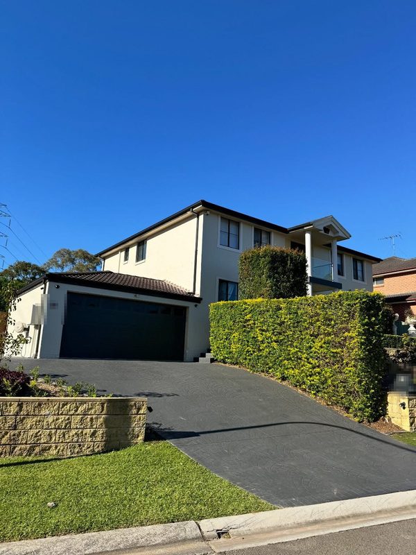 Full exterior repaint of a rendered two-storey home